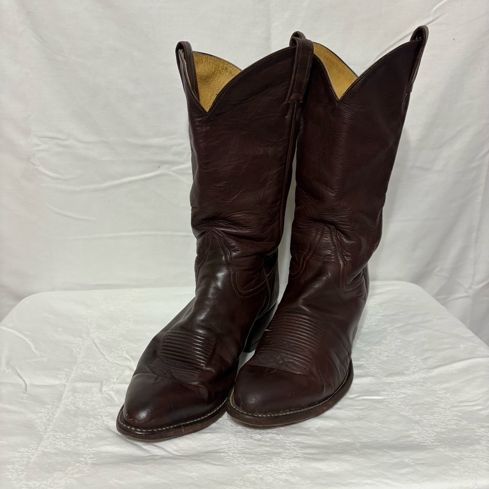 Vintage Tony Lama 5084 western cowboy boots in distressed brown leather.